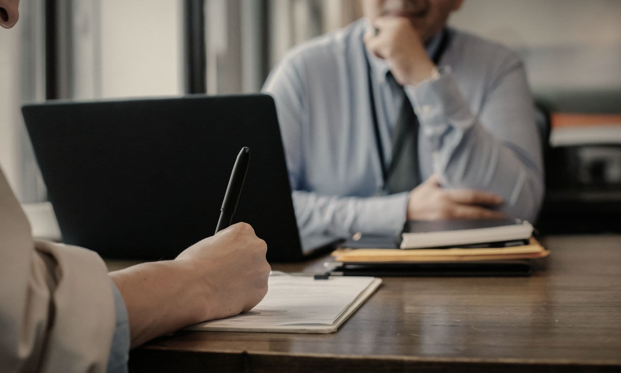 Hiring manager in a job interview noticing key things about the job applicant