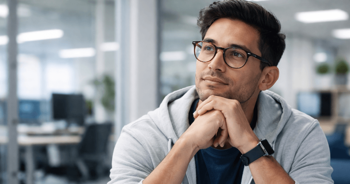 HR professional reviewing reduction in force checklist with selection criteria documentation and employee performance records