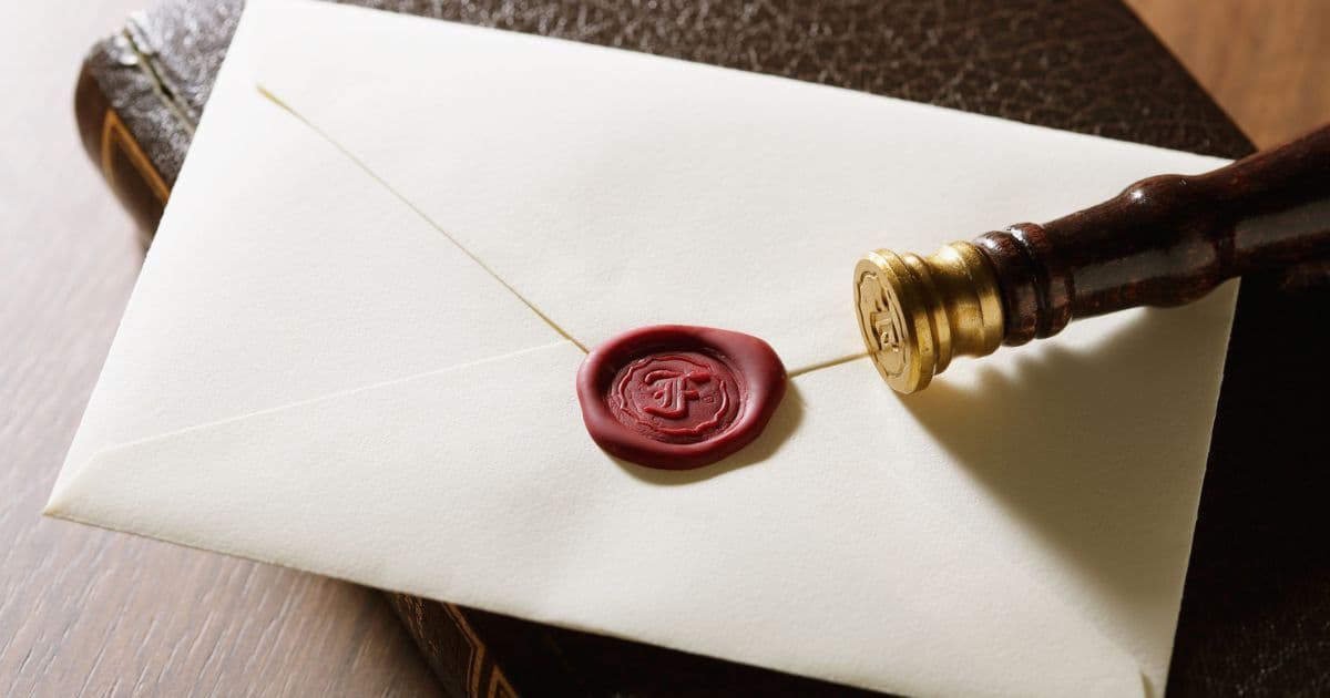 Job seeker reviewing a T-style cover letter that lines up employer requirements with matching skills to make fit easy for recruiters to scan.