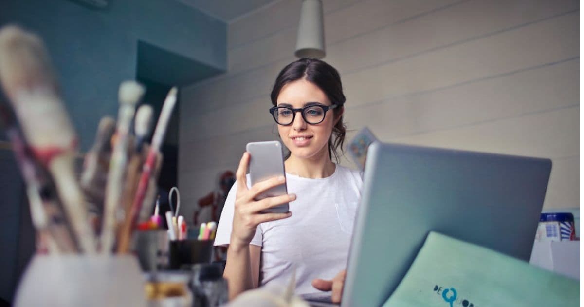 business owner working on resume and wondering how to put her self-employment as a job experience