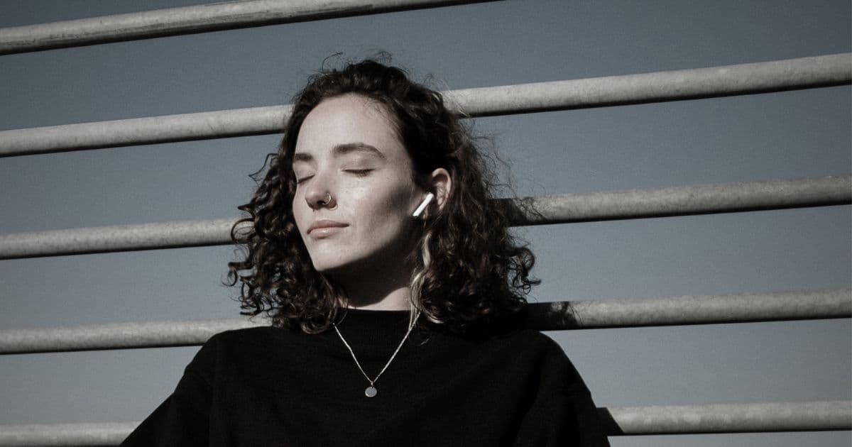 Lady enjoying her Apple AirPods