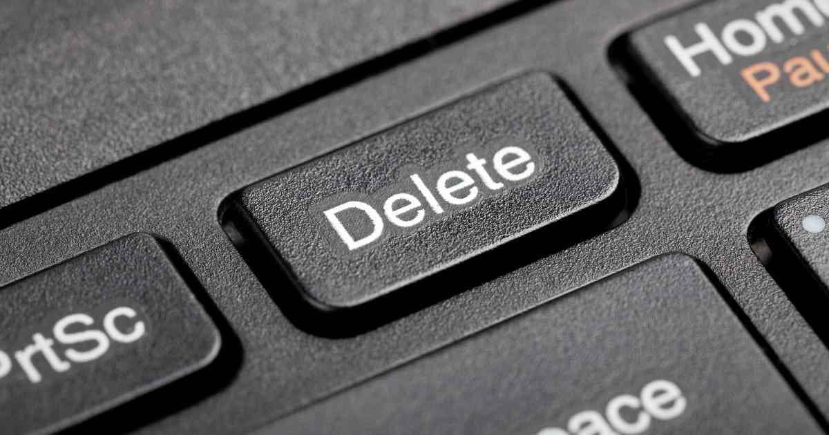 employee deleting files as they preparing for being laid off-keyboard
