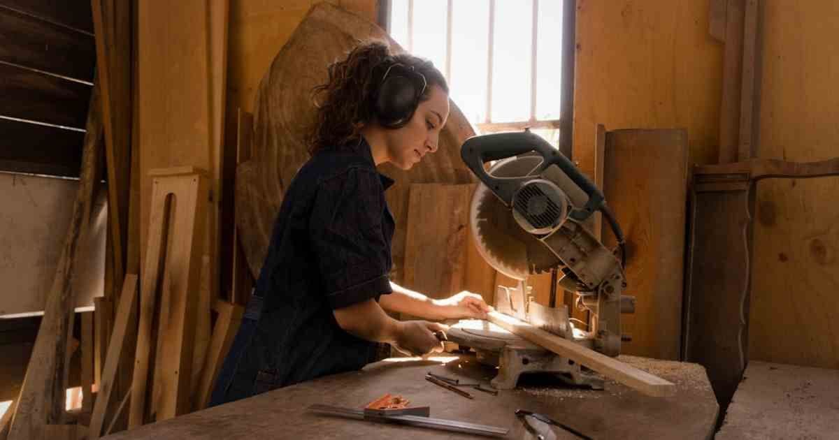 Trades woman cutting wood and wondering What mistakes are on my trades resume