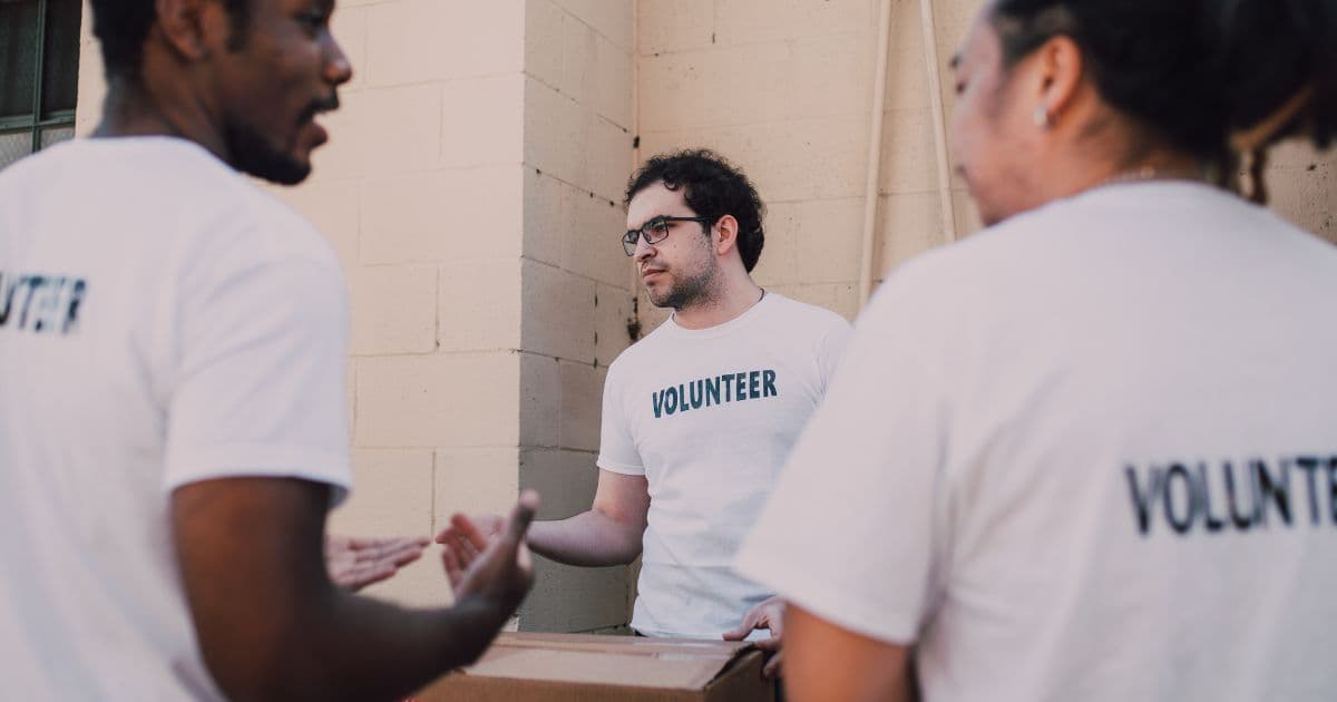 Resume showing volunteer experience section with professional formatting and quantified achievements from community work