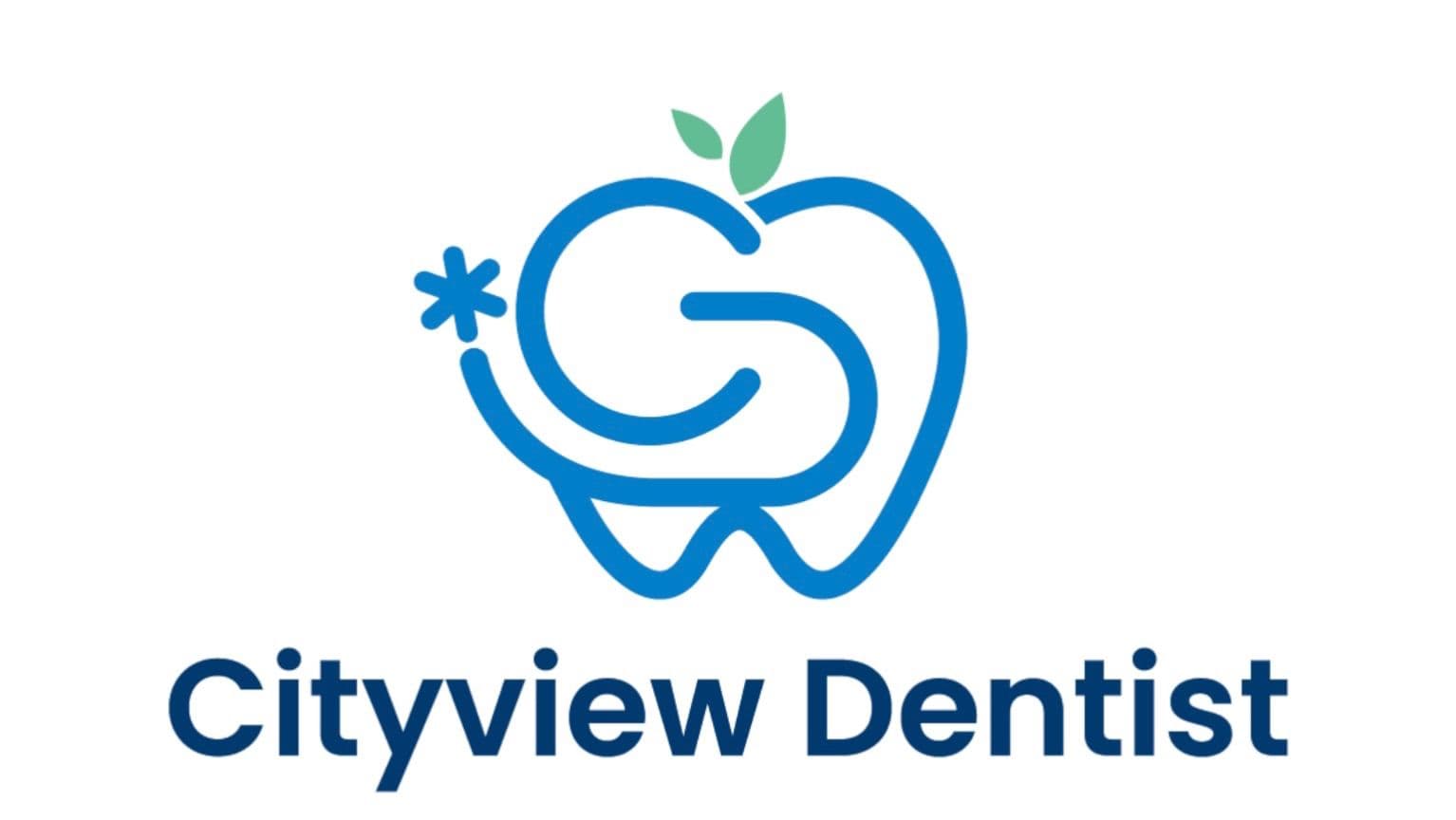 Dental clinic front desk team reviewing patient feedback together on a tablet at the reception area of CityView Smiles Dental